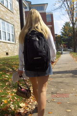 Teen blonde at the street upskirt view